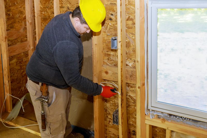 Electrician Working on Wiring